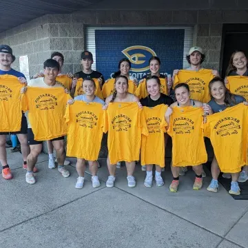 Kickball team poses with their Intramural Shirts